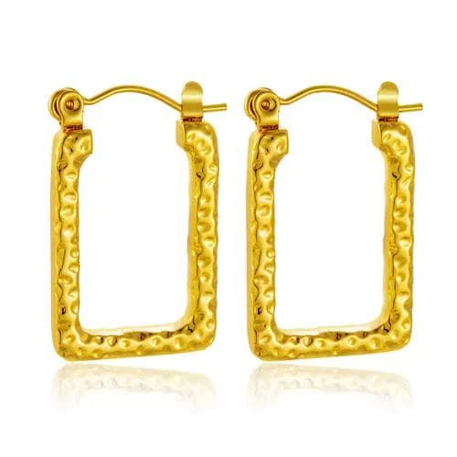 Aretes con diseño geométrico en estilo simple marco